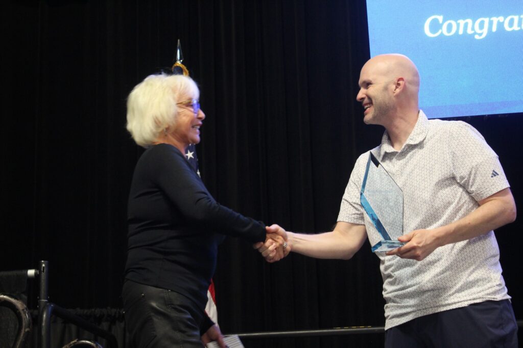 Titan Award: JCS Marketing CEO Jason Scott presents Deborah Miller, founder of Deerpoint Group, with the inaugural Titan Award at the 2026 Crop Consultant Conference in Visalia.