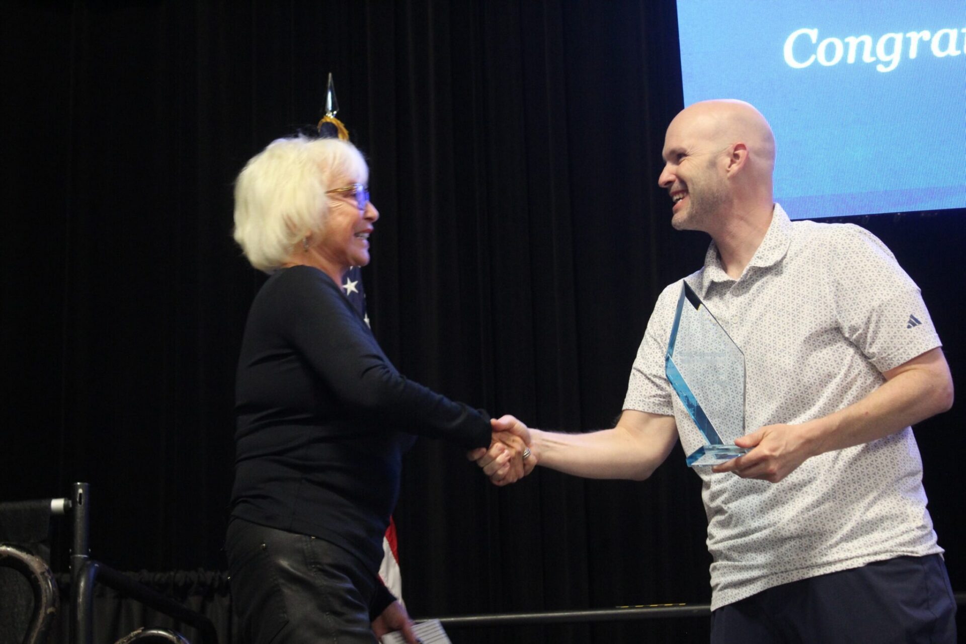 Titan Award: JCS Marketing CEO Jason Scott presents Deborah Miller, founder of Deerpoint Group, with the inaugural Titan Award at the 2026 Crop Consultant Conference in Visalia.