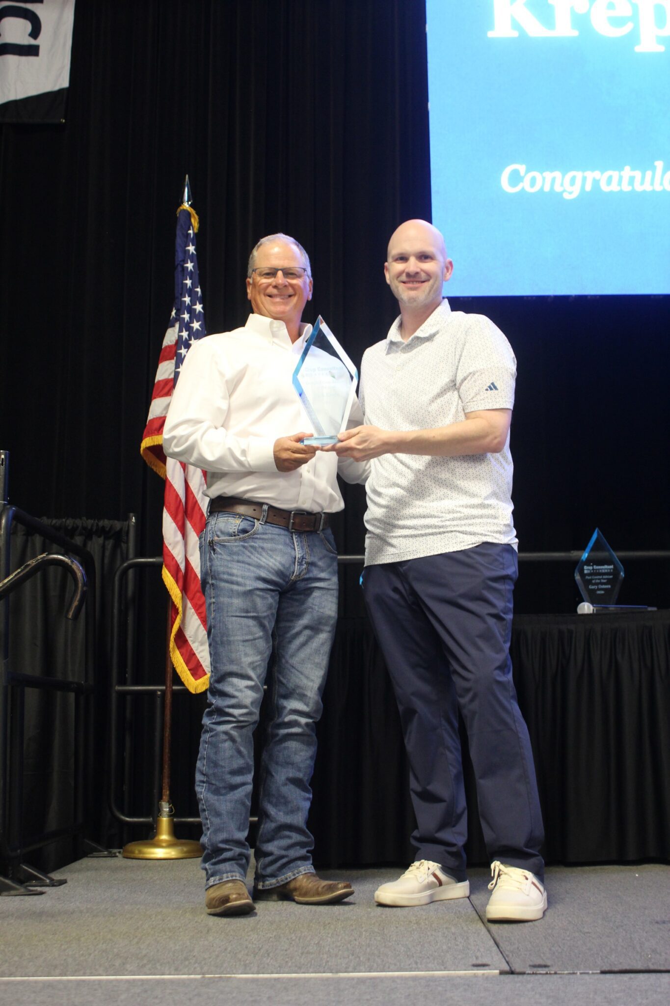 CCA of the Year: JCS Marketing CEO Jason Scott presents Rich Kreps, president of Ultra Gro, with the CCA of the Year award at the 2026 Crop Consultant Conference in Visalia.