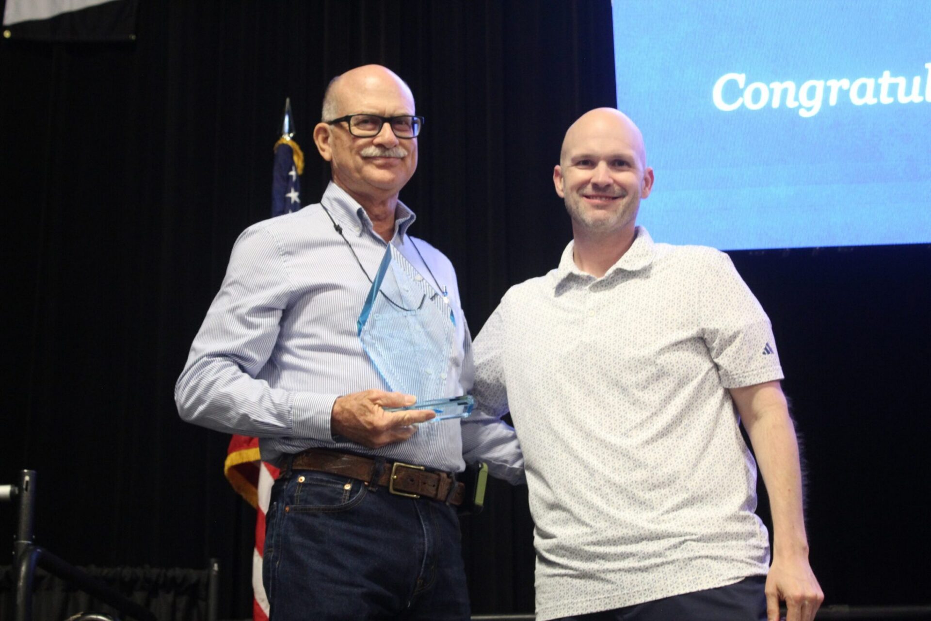 PCA of the Year: JCS Marketing CEO Jason Scott presents Gary Osteen with the PCA of the Year award at the 2026 Crop Consultant Conference in Visalia.