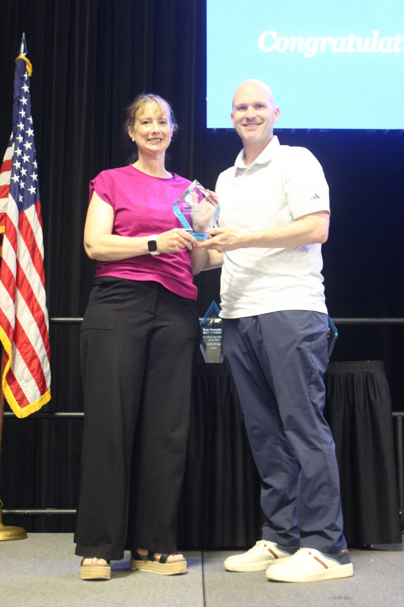 Researcher of the Year: JCS Marketing CEO Jason Scott presents Dr. Elizabeth Fichtner, UCCE Tulare County orchard systems advisor, with the Researcher of the Year award at the 2026 Crop Consultant Conference in Visalia.